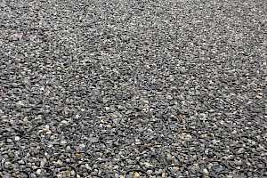 Close-up of edging between CORE gravel and asphalt