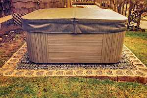 Enjoy your summers in your hot tub! CORE Hot Tub Foundation Kits allow you to be as creative as you want with your surround.