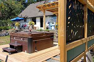 A floating deck being installed on top of a CORE Hot Tub Foundation.